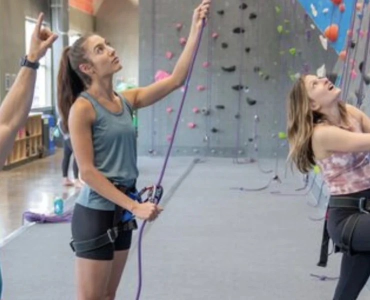 an image of Movement members taking a climbing class